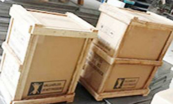 Box with wooden frame to minimize impact shock